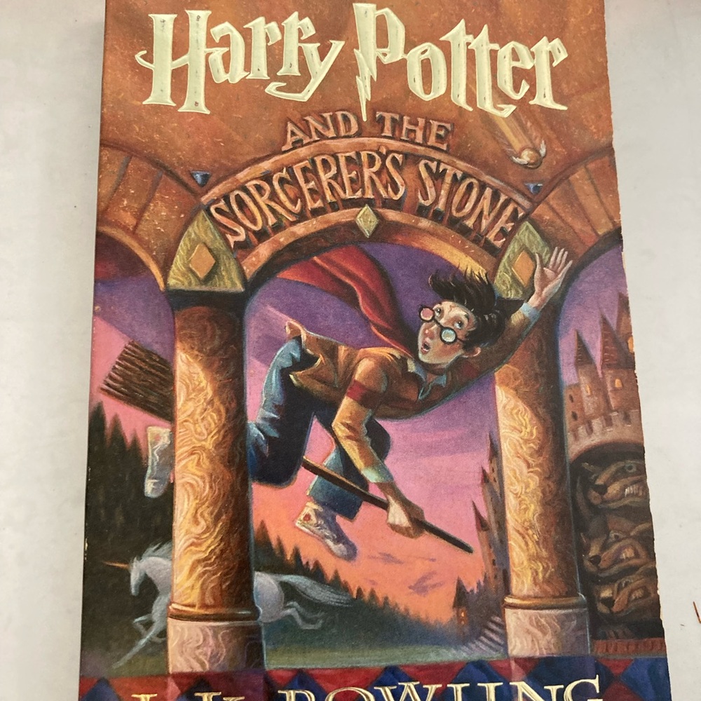Harry Potter and the Sorcerer’s Stone book and dvds